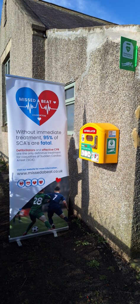 MissedABeat install an AED at Lands Village Hall